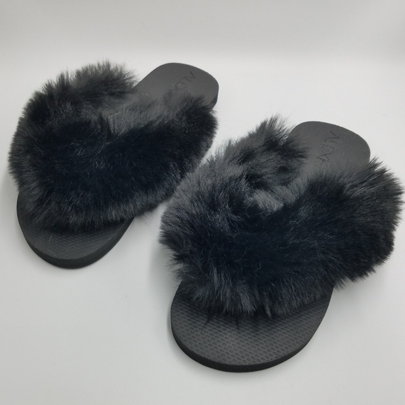 black fluffy flip flops